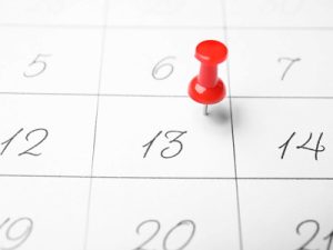 calendar with a red pin in it