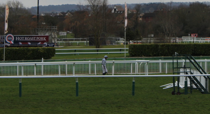 jockey on the long walk back following a fall