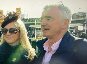 michael oleary being interviewed in cheltenham racecourse parade ring