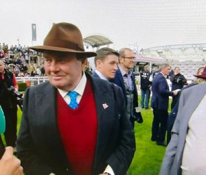 nicky henderson being interviewed in cheltenham parade ring