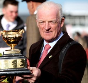 willie mullins holding the cheltenham gold cup