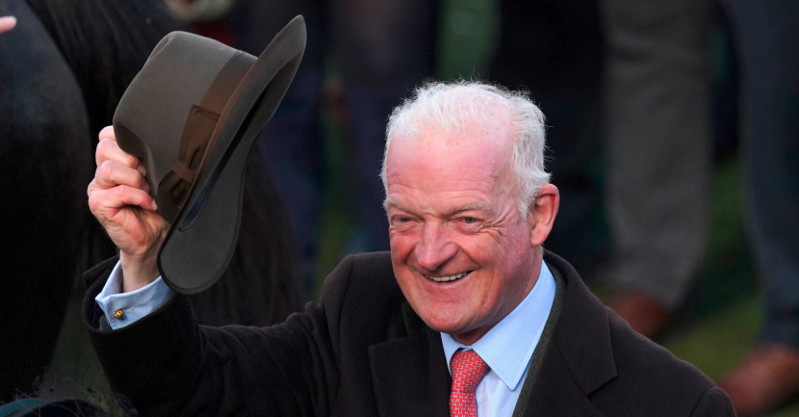 willie mullins waving with his cap